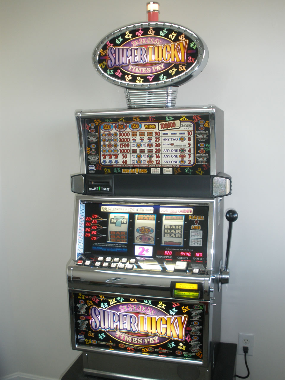 Slot Machines with Lighted Toppers
