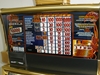 IGT CLEOPATRA FIVE REEL S2000 SLOT MACHINE WITH FREE SPIN BONUS AND LIGHTED TOPPER - 