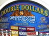 IGT DOUBLE DOLLARS STRIKE S2000 SLOT MACHINE WITH QUARTER COIN HANDLING - 
